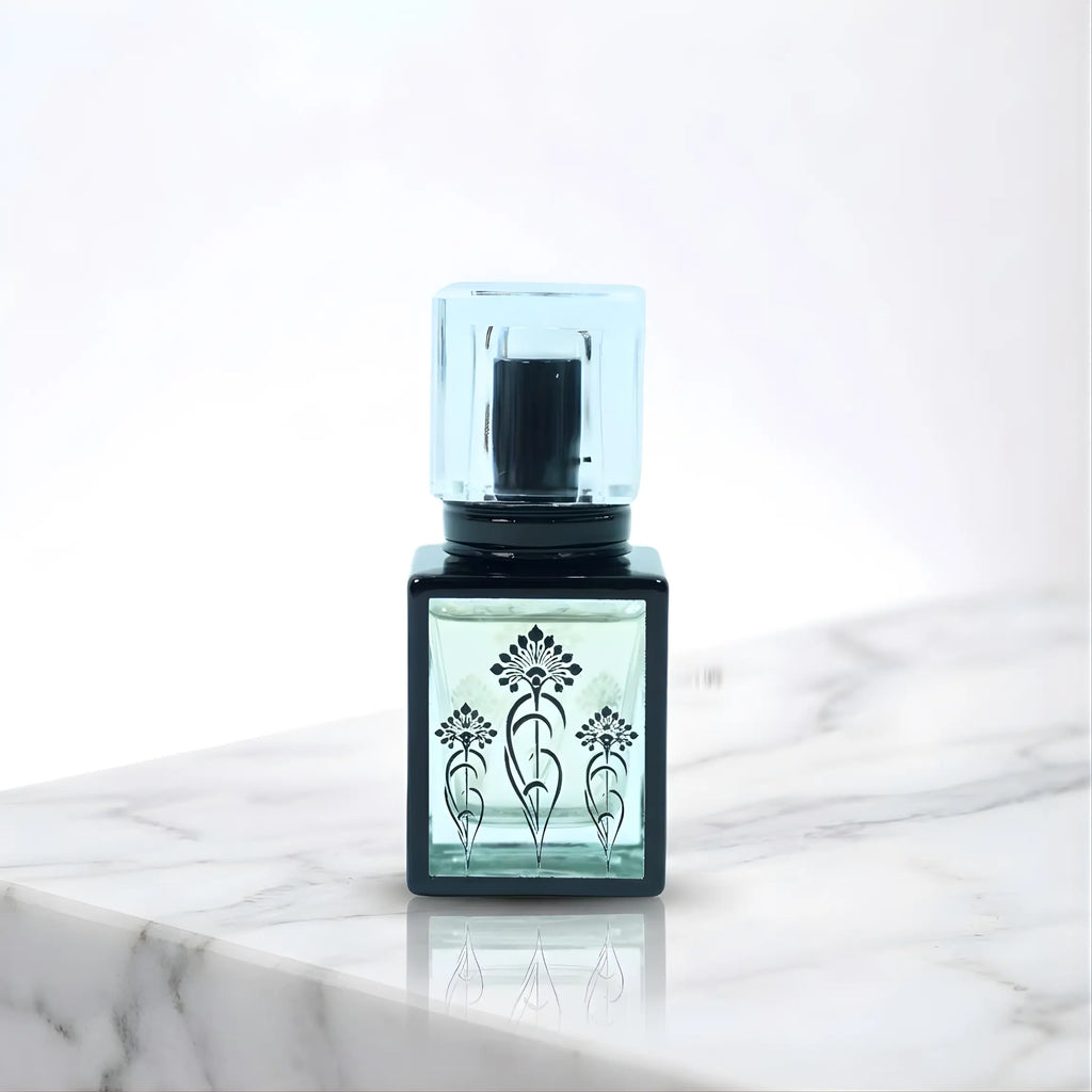 Naked Bloom Aquatic Oud Bliss perfume bottle with fresh aquatic and woody fragrance notes